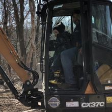 Four Seasons Landscaping Back Hoe